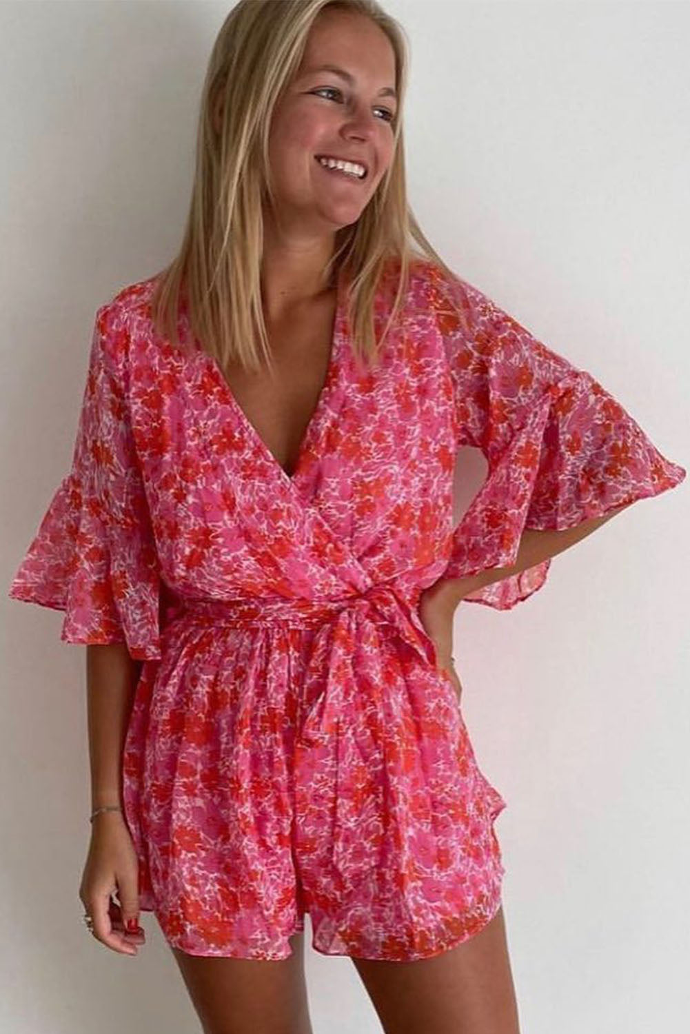 Wrap V Neck Ruffled Sleeve Floral Romper