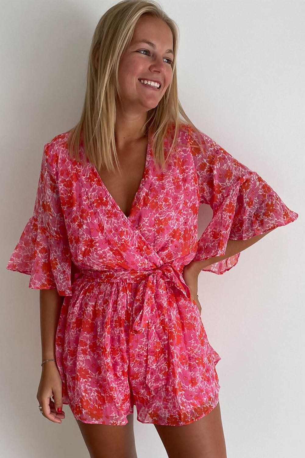 Wrap V Neck Ruffled Sleeve Floral Romper